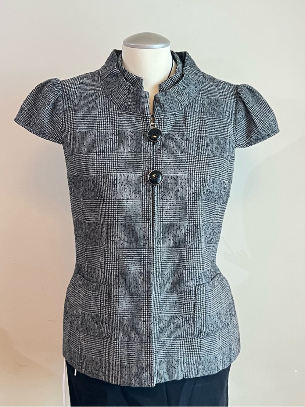 Vintage black & white plaid button-up blouse with puffed sleeves.